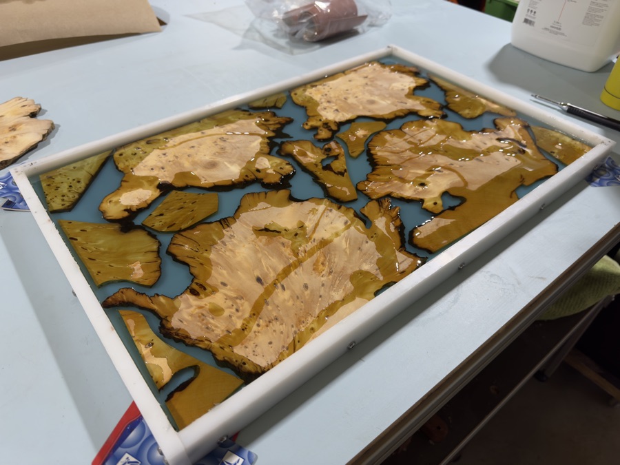 Huon Pine birdseye burl sheet pour with blue epoxy